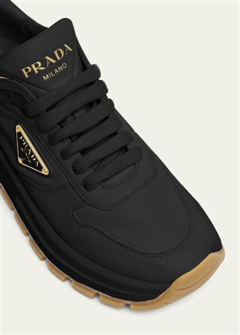 prada leather logo runner sneakers|prada black sneakers women's.